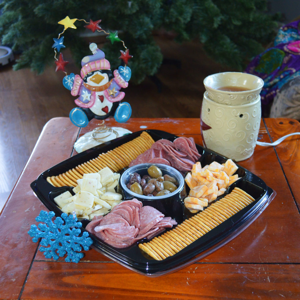 HORMEL GATHERINGS® Party Trays made for a great snack to accompany your Christmas traditions this year. Plus, the kids spend much less time whining when they have food in their mouth!