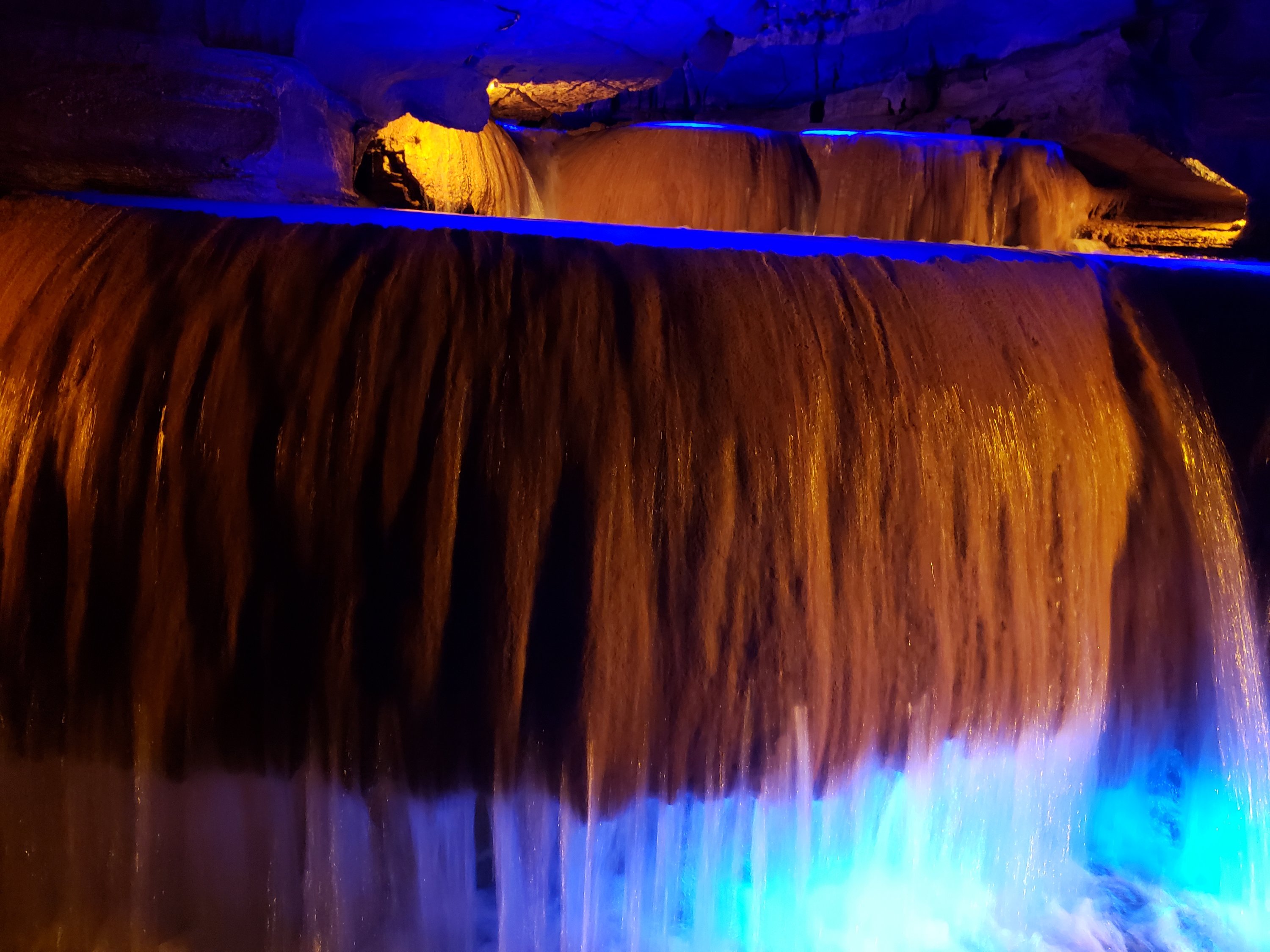 Squire Boone Caverns unique cave formations lit with blue lights