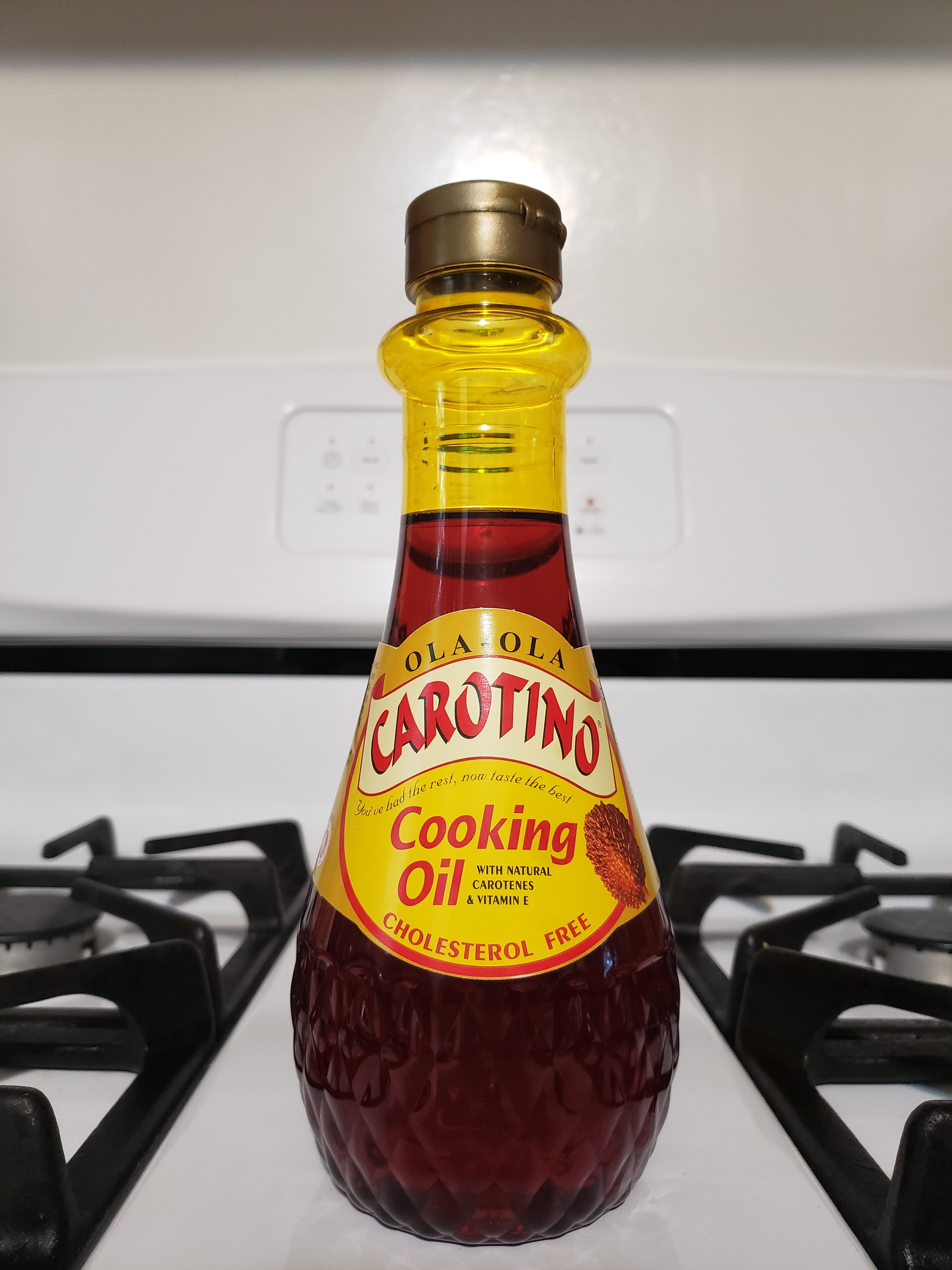 cooking oil bottle on stove top