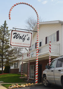 large candy cane Wolf’s Homemade Candy signage 