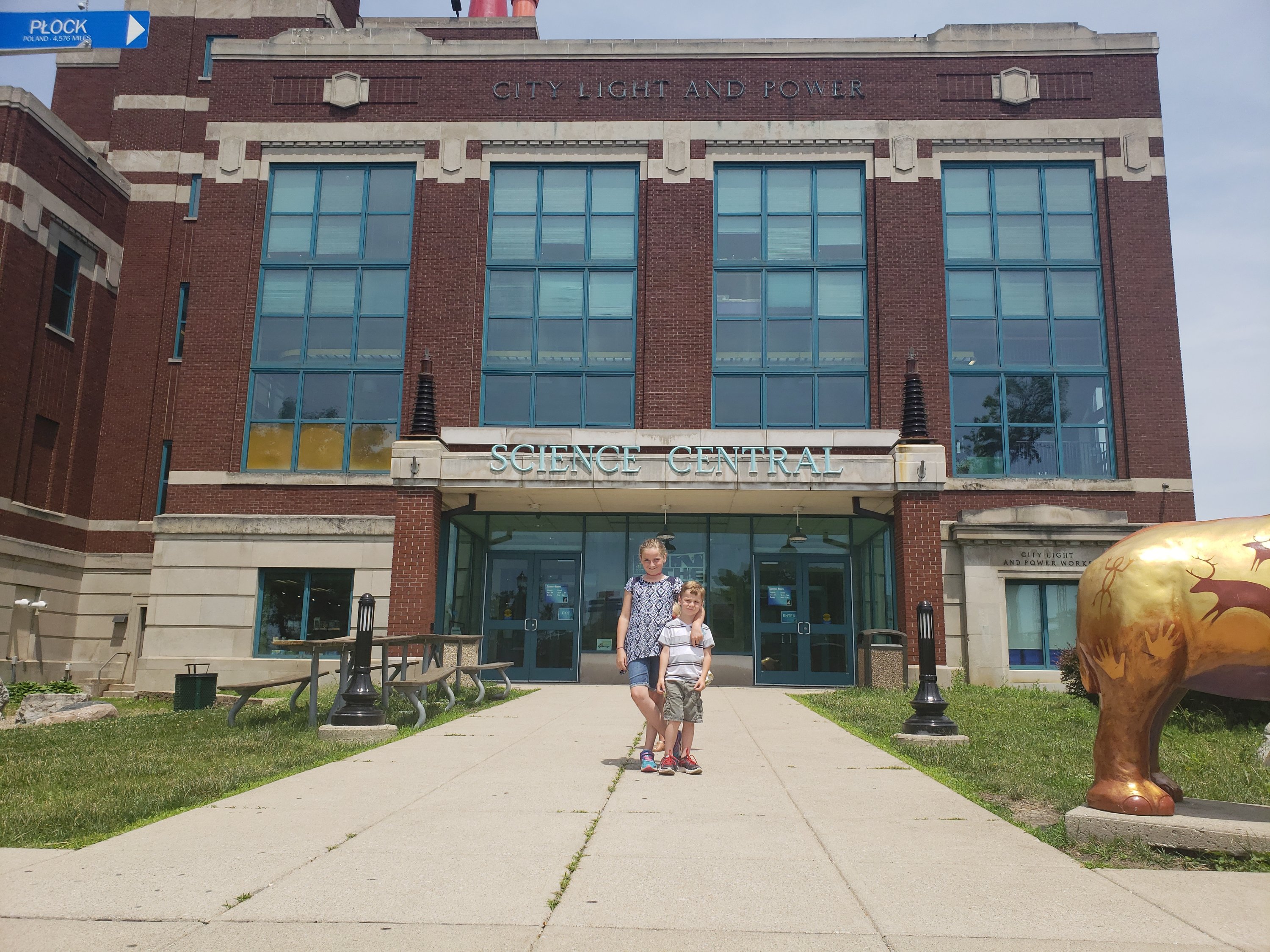 two children standing in front of Science Central in downtown Fort Wayne