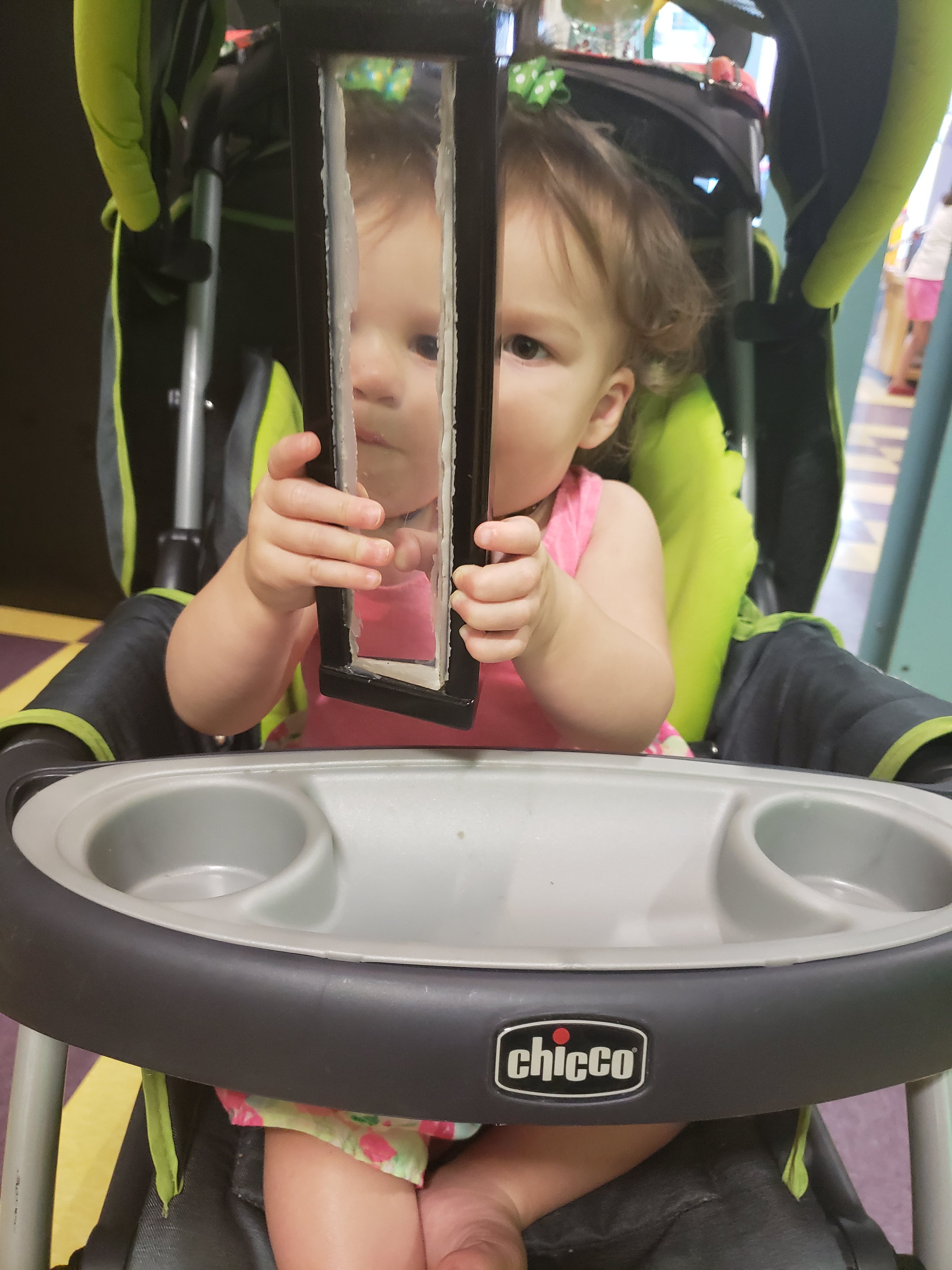 a young child in a stroller