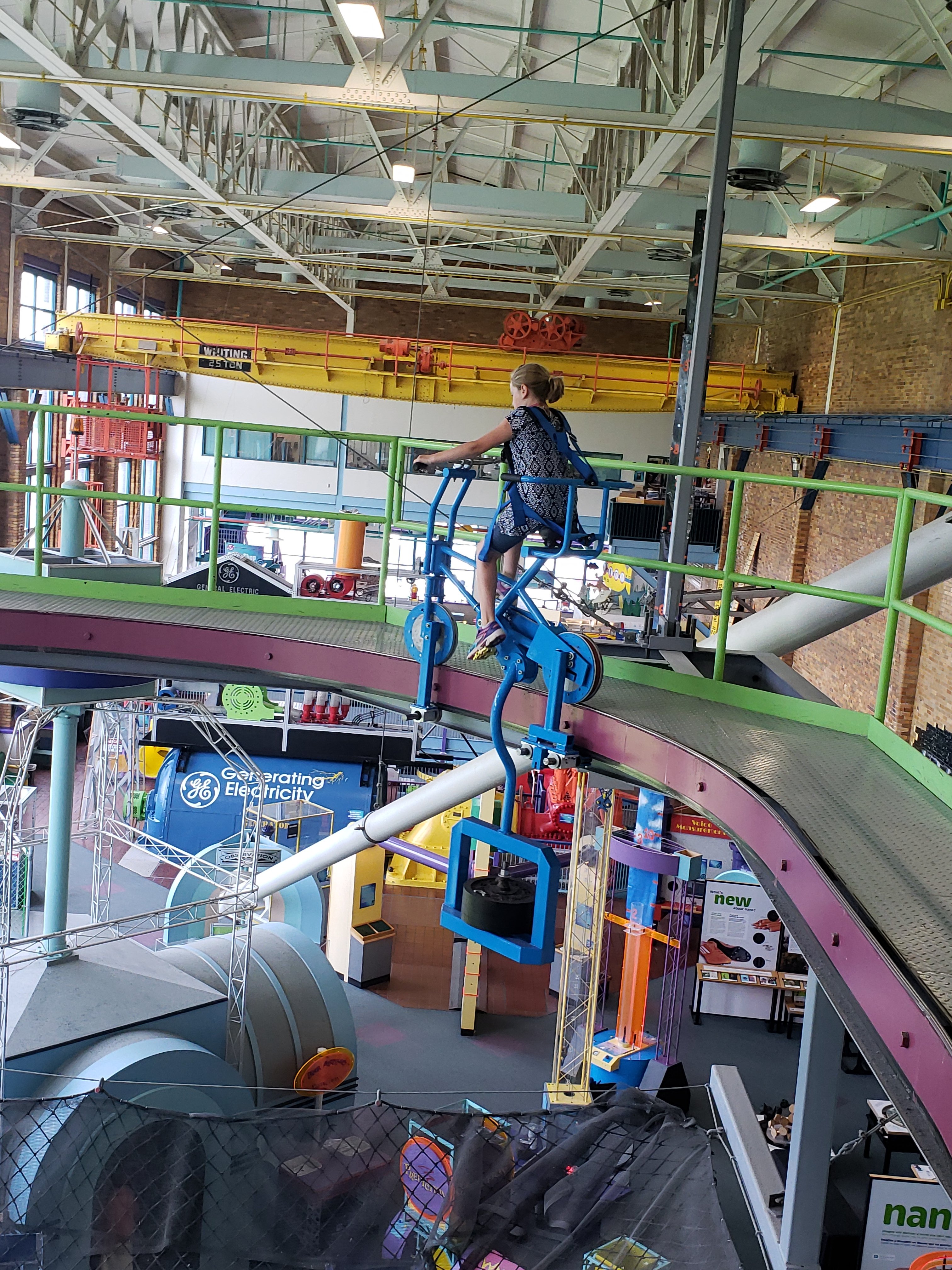 girl enjoying some of the interactive science center activities