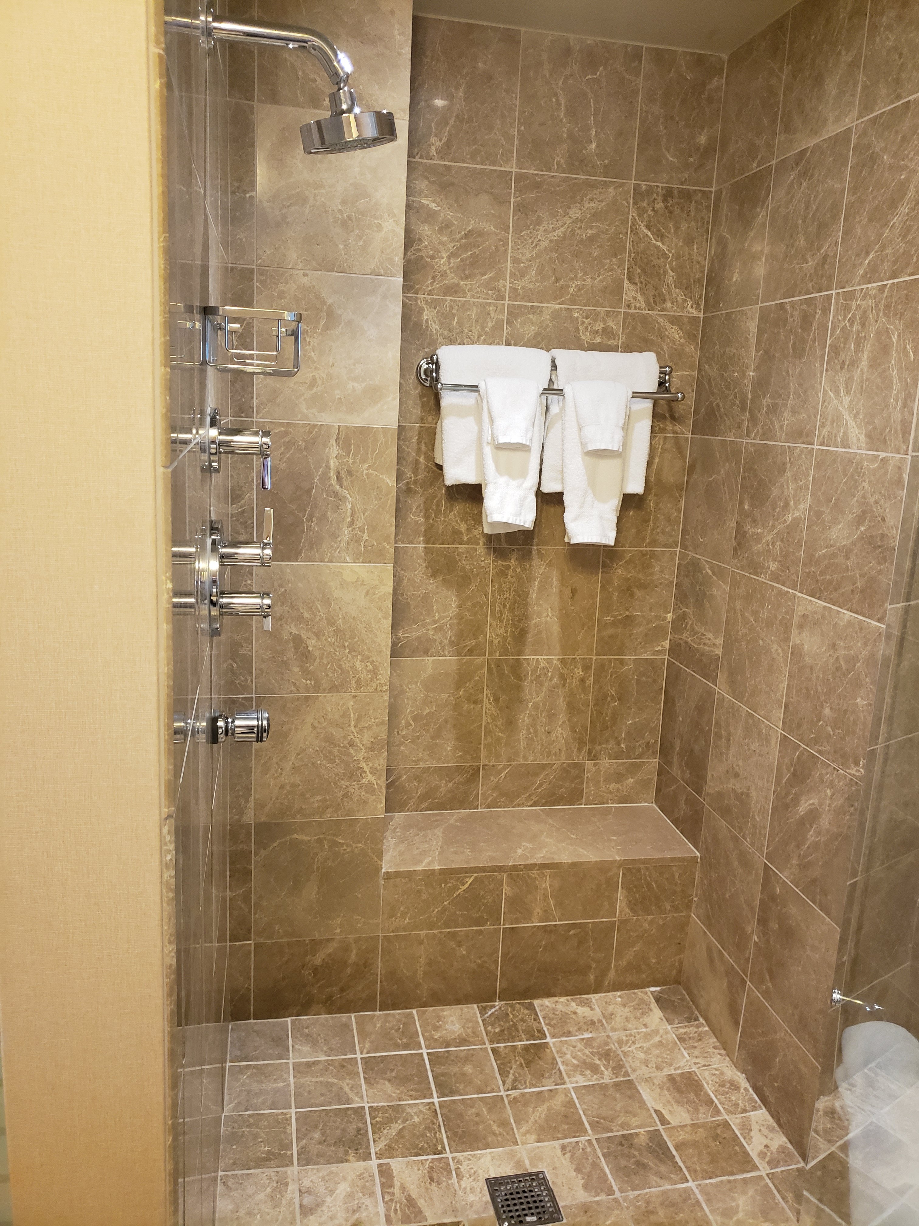 large walk in shower in the Isle Casino and Hotel Bettendorf room