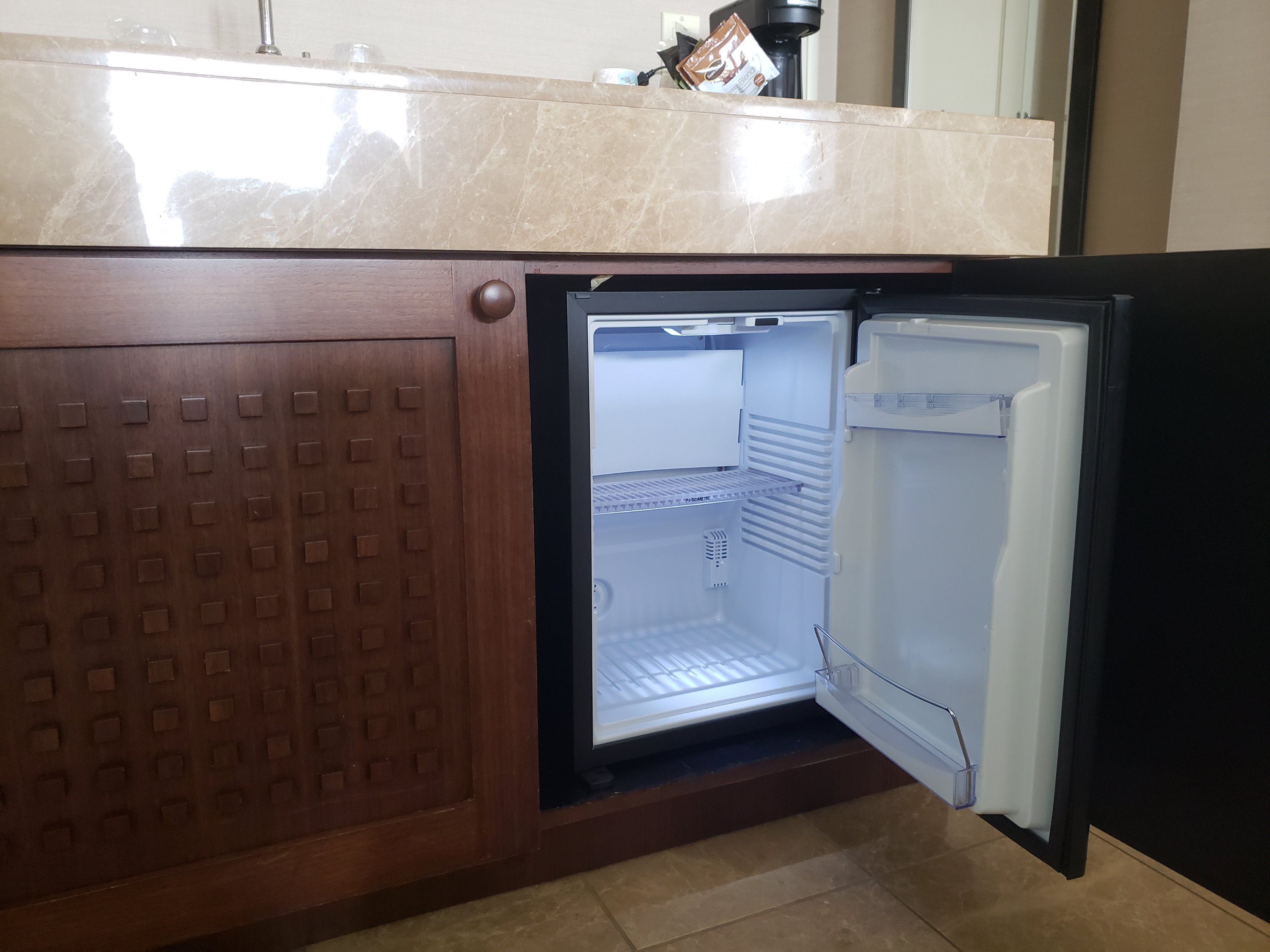 clean mini fridge in Isle Casino and Hotel Bettendorf room