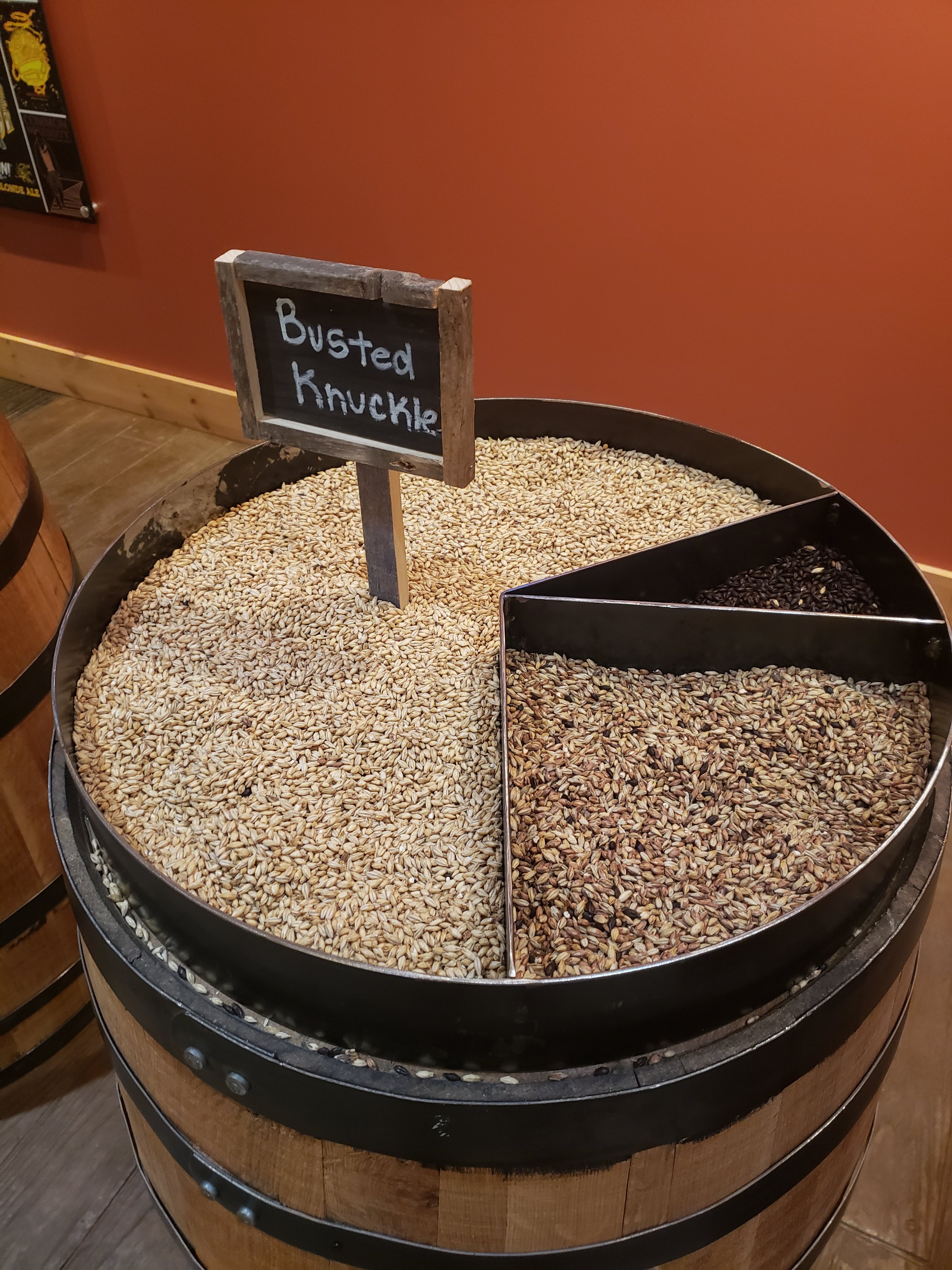 barrel with different grains on table