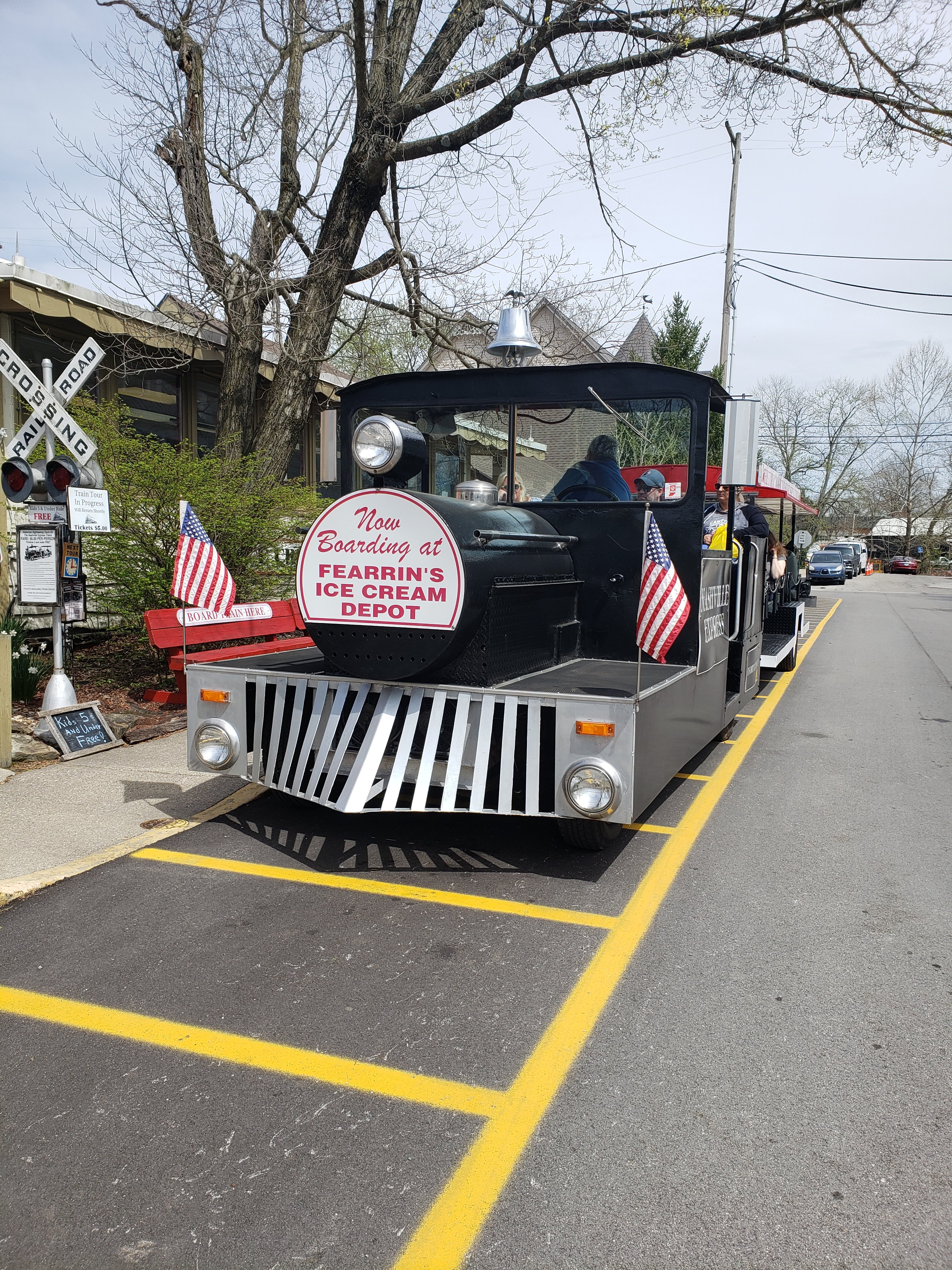 Th Fearrin's Ice Cream Depot train in a parking space waiting for people to board